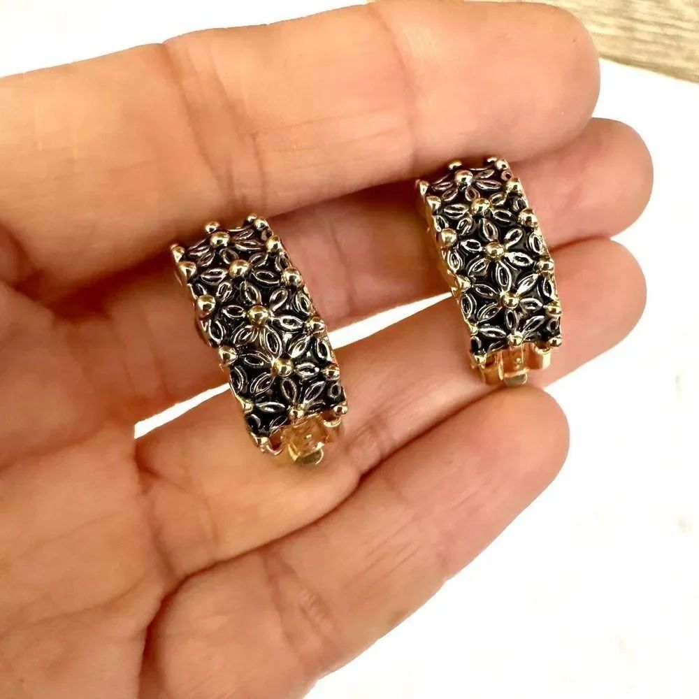 Gold tone black floral clip on earrings